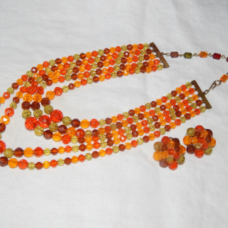 Vintage plastic multi-string necklace with clip on earrings