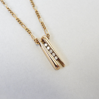 Little 9ct Gold chain with a Diamond Pendant