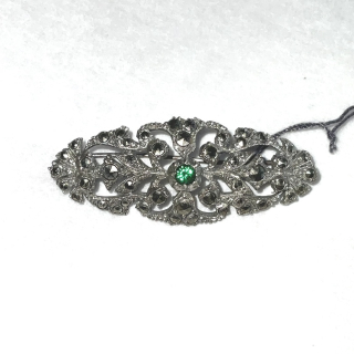 Marcasite Vintage brooch set with a green centre stone