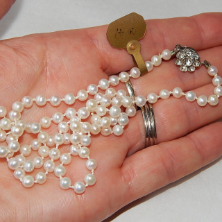 58cm Cultured pearl Necklace Valued $2,350