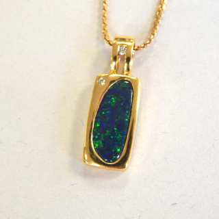 Black Opal, Diamonds and 18ct Gold Pendant, on 9ct Chain