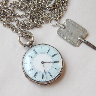 Antique Key Wind Ladies FOB watch and Long Chain