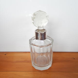 1905 Sterling Silver flat sided perfume bottle.